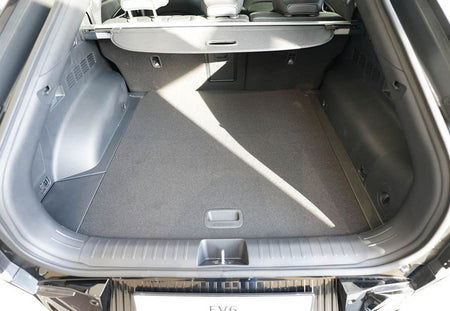 KIA EV6 2021->. Bagasjeromsmatte. Øvre del.